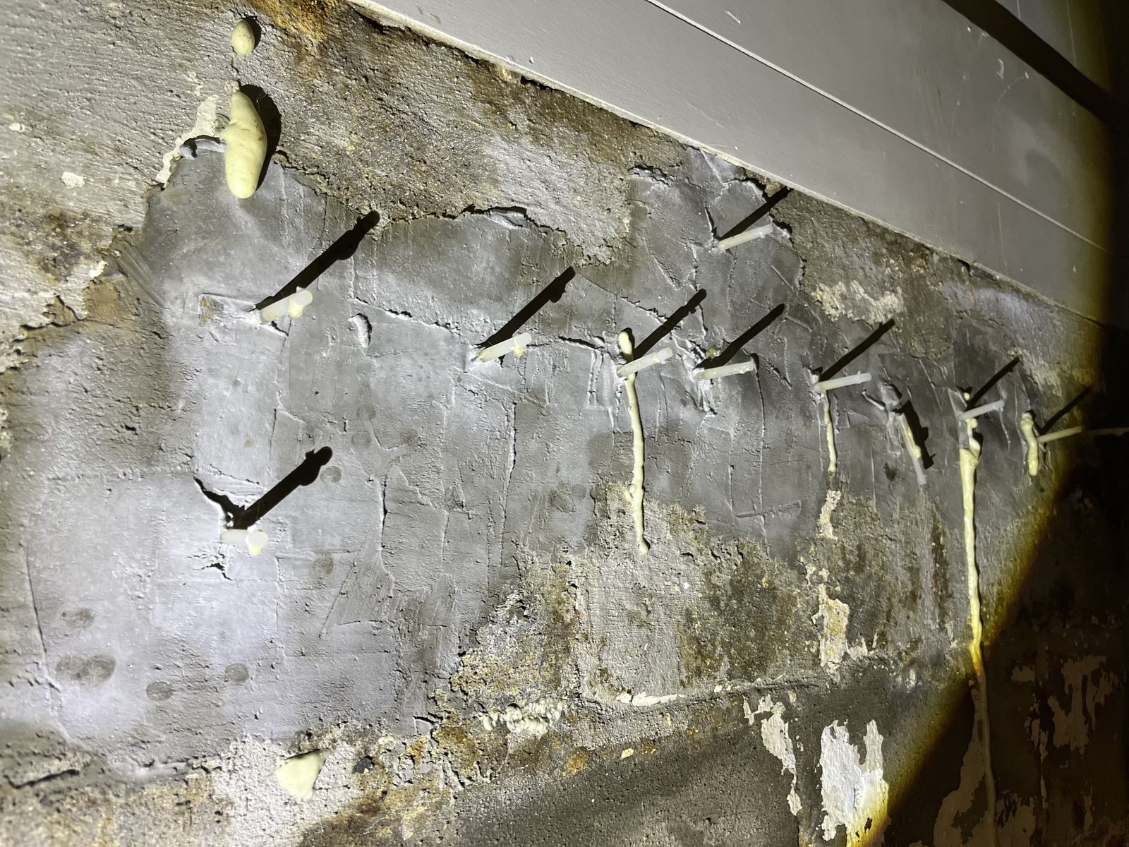 Previous epoxy injection repair on a block foundation wall found during a home inspection in Vanier, Ottawa